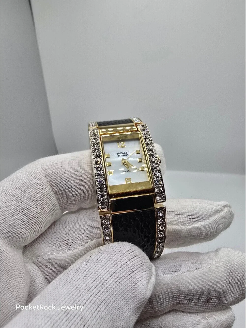 Embassy by Gruen Women’s Quartz Rectangle Analog White Dial Gold Black Bangle